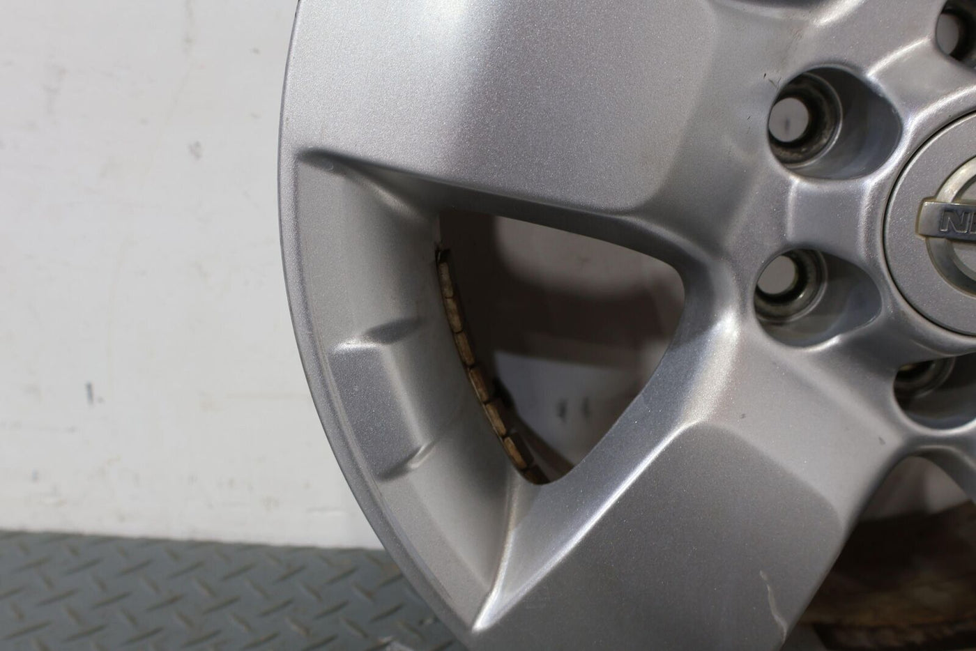 09-14 Nissan Xterra 16" OEM Rear Wheel (Face Marks) Silver With Center Cap