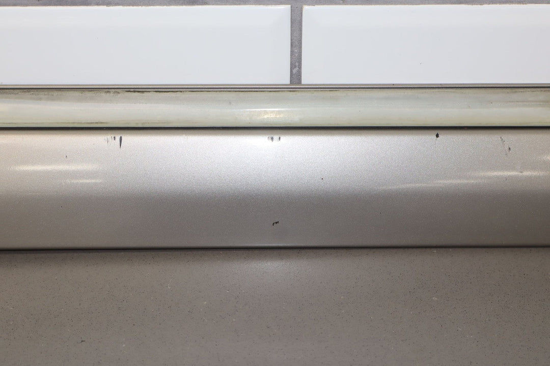 00 - 06 Chevy Suburban GMT800 Left Front Door Molding (Pewter Metallic 11U)