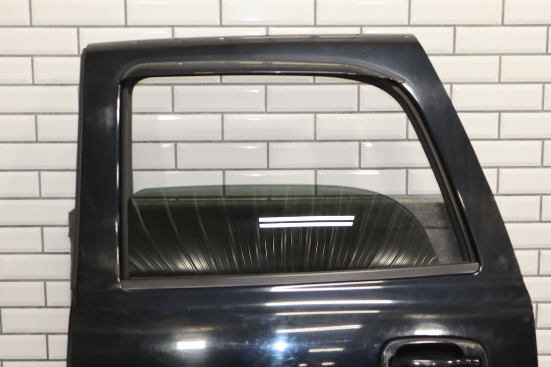 00 - 06 Chevy Tahoe GMT800 Left Rear Door (Black 41U)