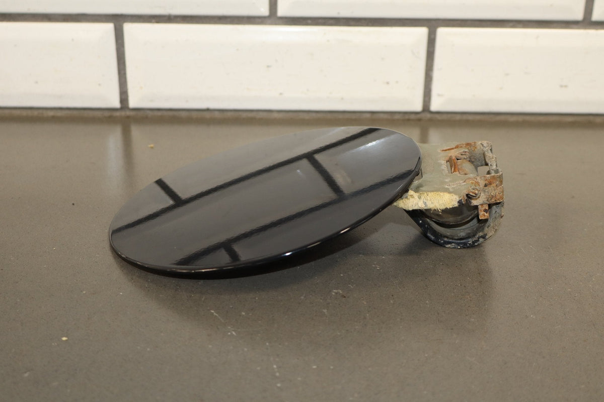 00-06 Chevy Tahoe/Suburban GMT800 Fuel Door Black 41