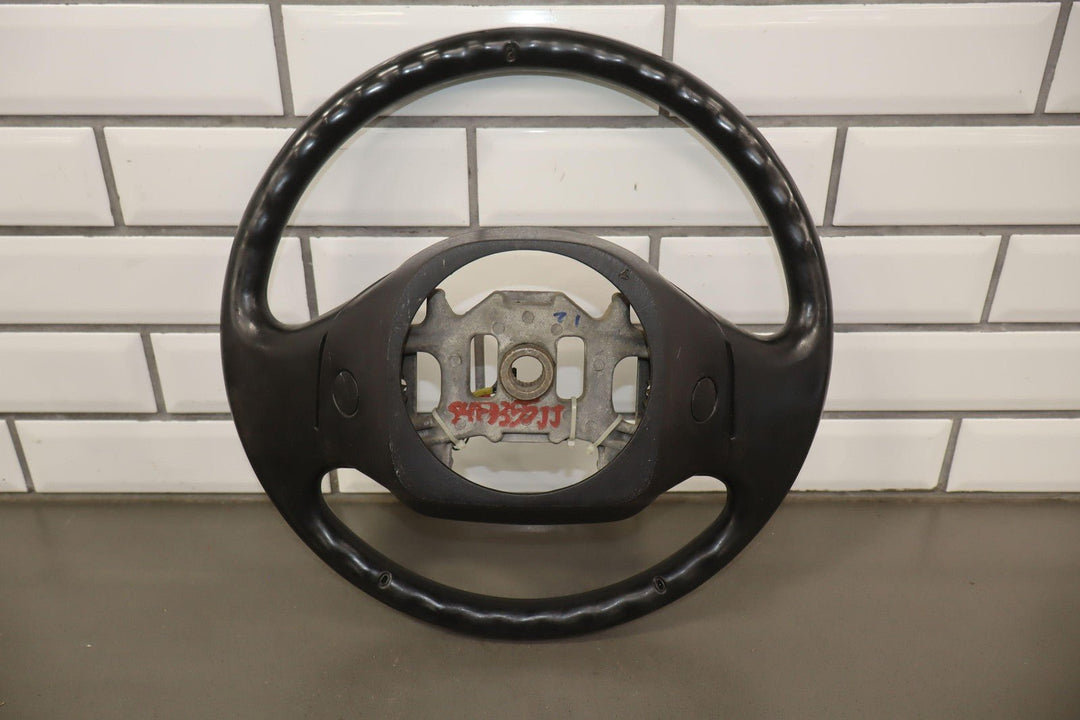 02 - 04 Ford F250 Super Duty Black Vinyl Steering Wheel with Cruise Control