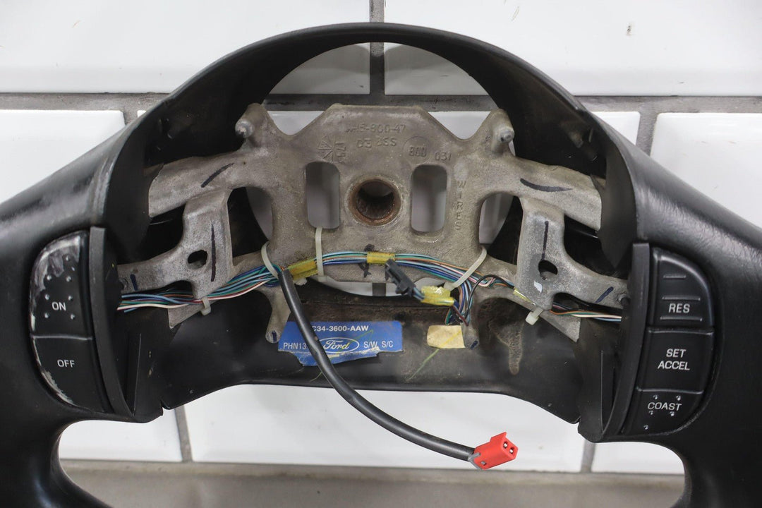 02 - 04 Ford F250 Super Duty Black Vinyl Steering Wheel with Cruise Control