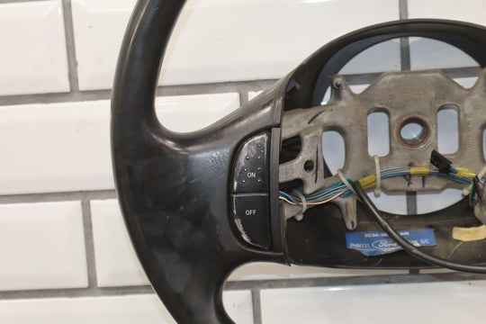 02 - 04 Ford F250 Super Duty Black Vinyl Steering Wheel with Cruise Control
