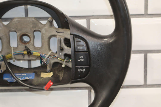 02 - 04 Ford F250 Super Duty Black Vinyl Steering Wheel with Cruise Control