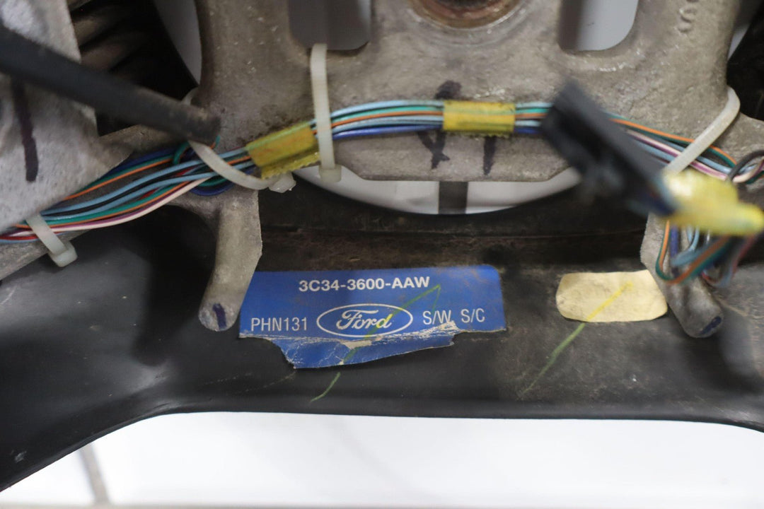 02 - 04 Ford F250 Super Duty Black Vinyl Steering Wheel with Cruise Control