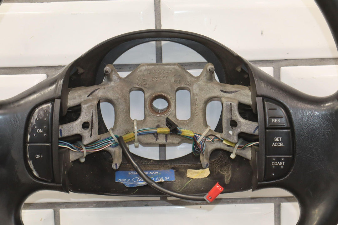 02 - 04 Ford F250 Super Duty Black Vinyl Steering Wheel with Cruise Control