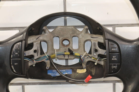 02 - 04 Ford F250 Super Duty Black Vinyl Steering Wheel with Cruise Control