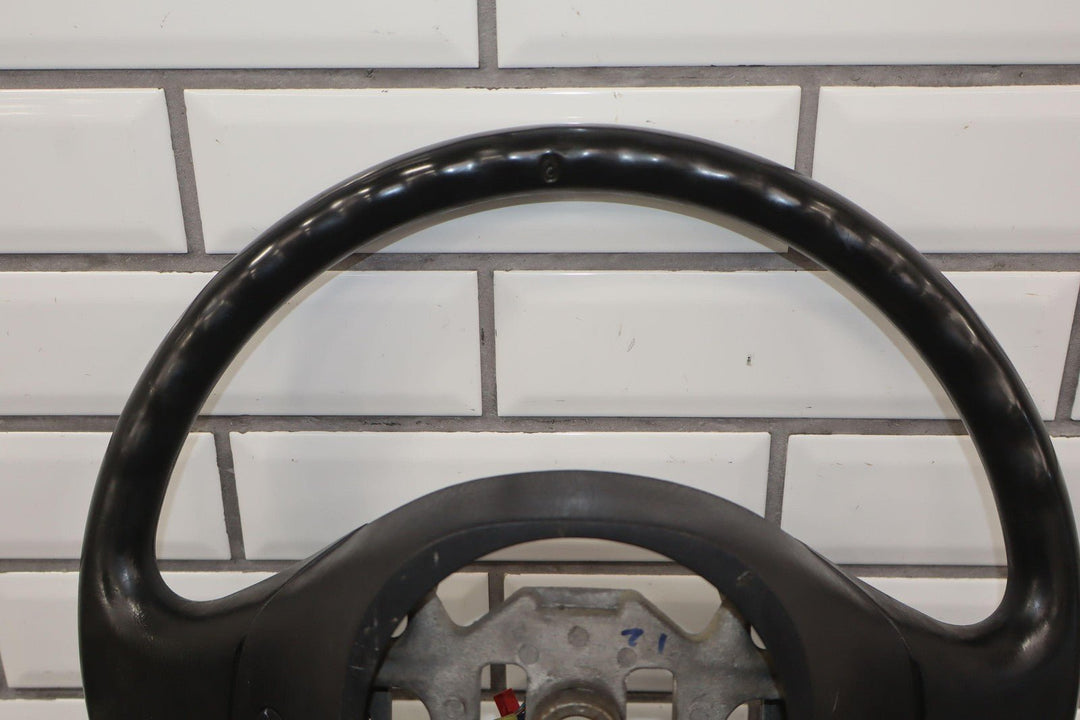 02 - 04 Ford F250 Super Duty Black Vinyl Steering Wheel with Cruise Control