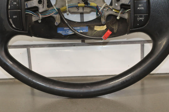 02 - 04 Ford F250 Super Duty Black Vinyl Steering Wheel with Cruise Control