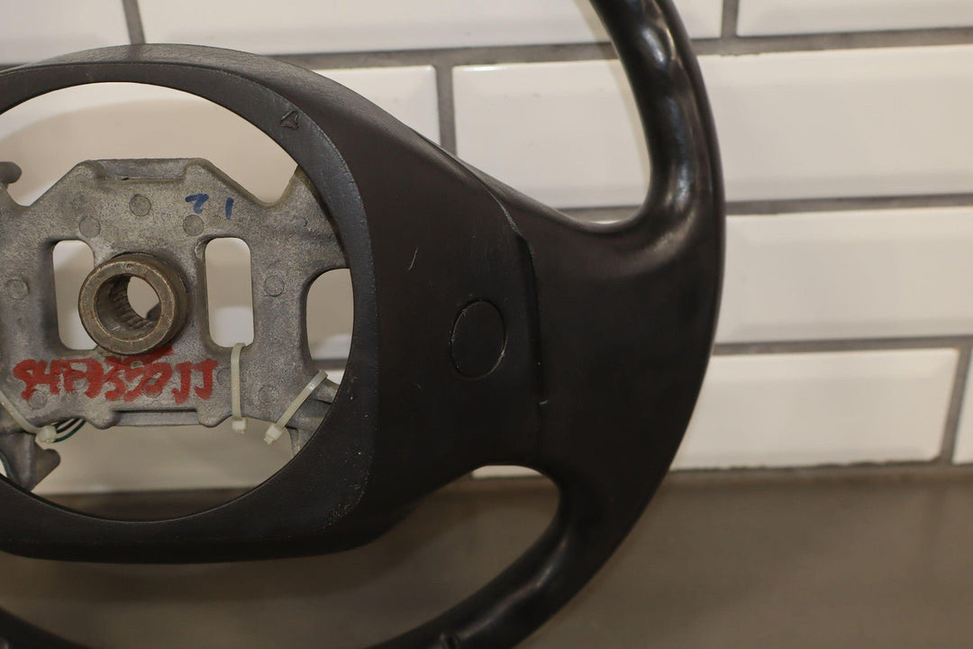 02 - 04 Ford F250 Super Duty Black Vinyl Steering Wheel with Cruise Control