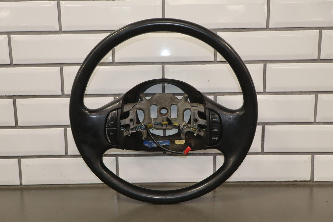 02 - 04 Ford F250 Super Duty Black Vinyl Steering Wheel with Cruise Control