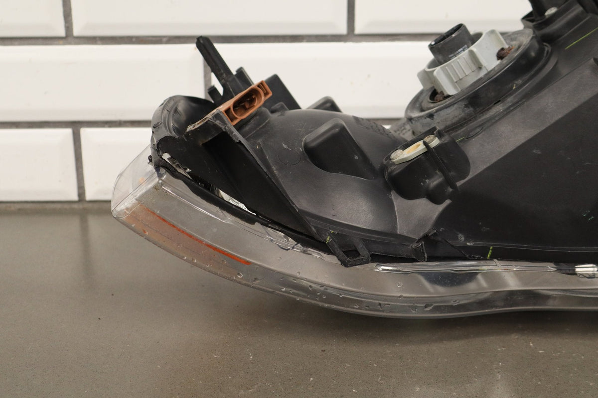02-05 Dodge Ram LH Headlight OEM 55077121AG