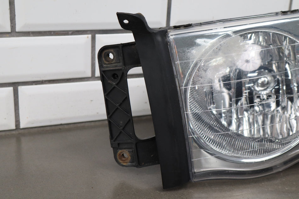 02-05 Dodge Ram LH Headlight OEM 55077121AG