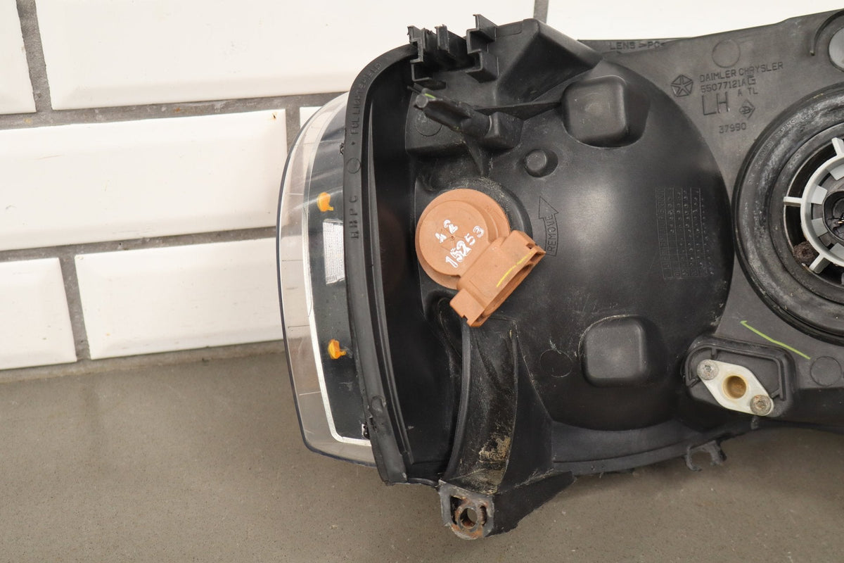 02-05 Dodge Ram LH Headlight OEM 55077121AG