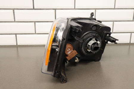 02-05 Dodge Ram LH Headlight OEM 55077121AG