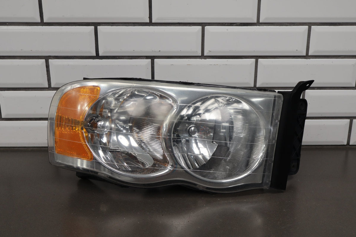 02-05 Dodge Ram RH Headlight OEM 55077120AG