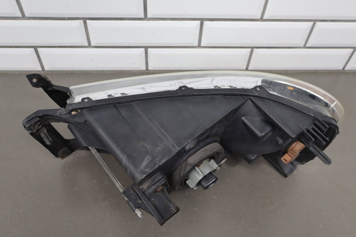 02-05 Dodge Ram RH Headlight OEM 55077120AG