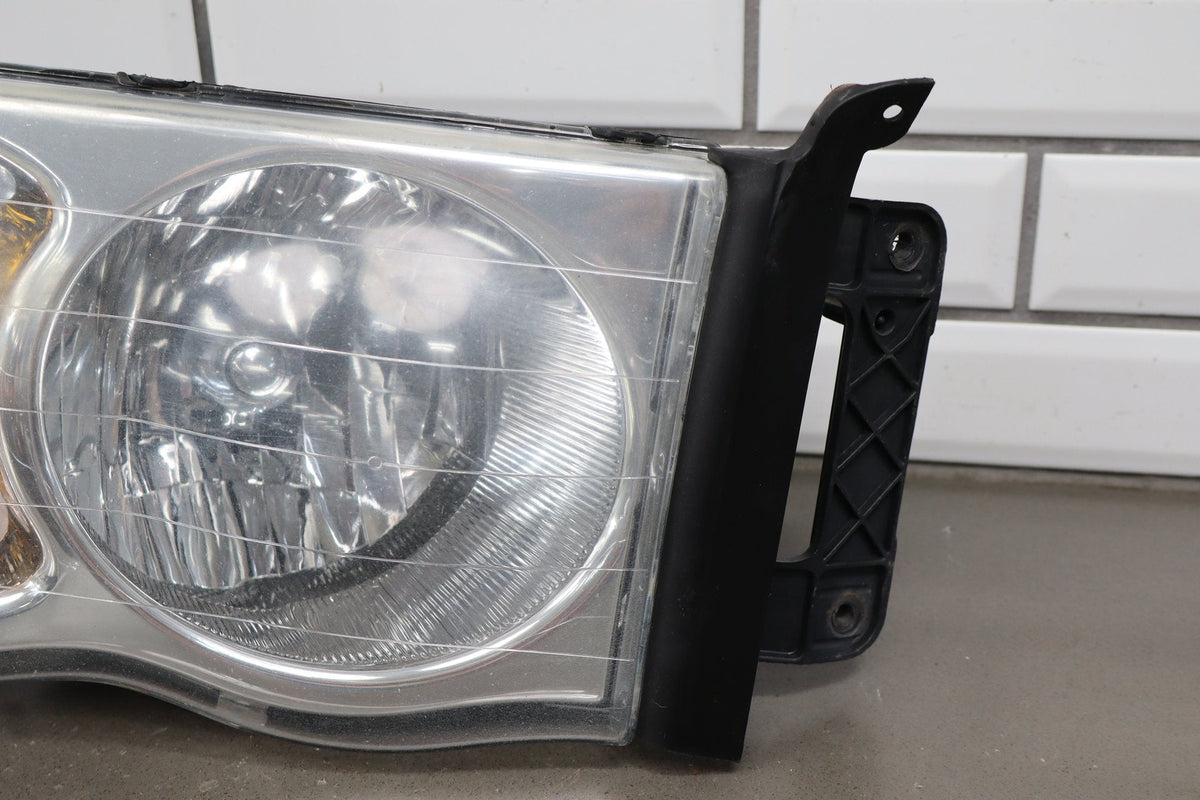 02-05 Dodge Ram RH Headlight OEM 55077120AG