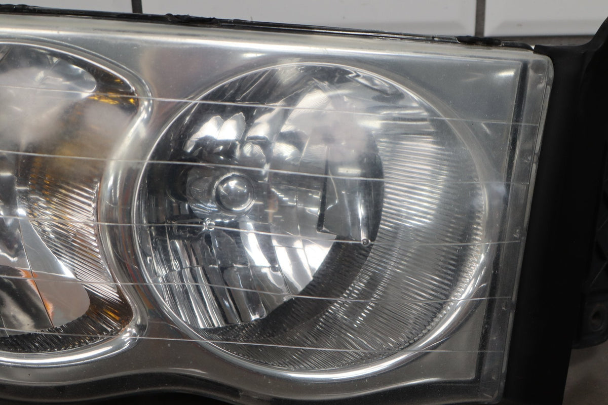 02-05 Dodge Ram RH Headlight OEM 55077120AG
