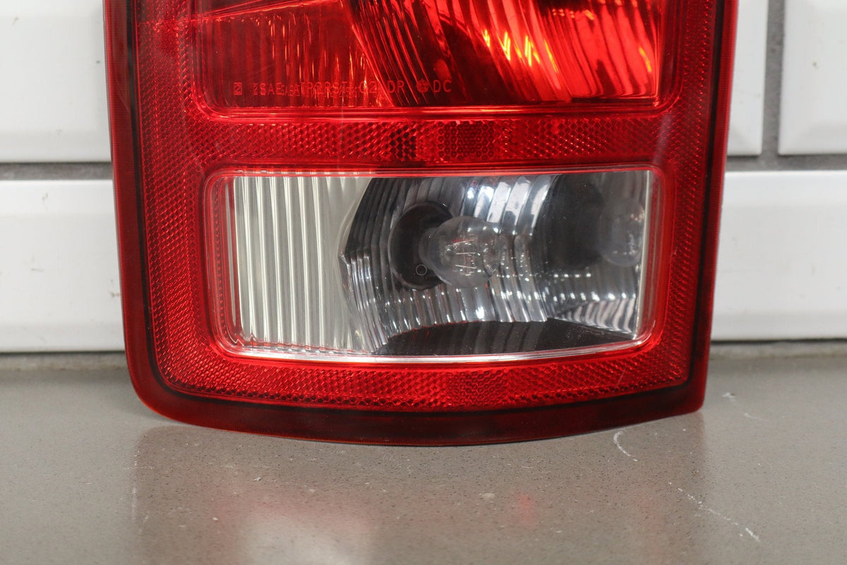 02-06 Dodge Ram LH Tail Light OEM 55077347AC