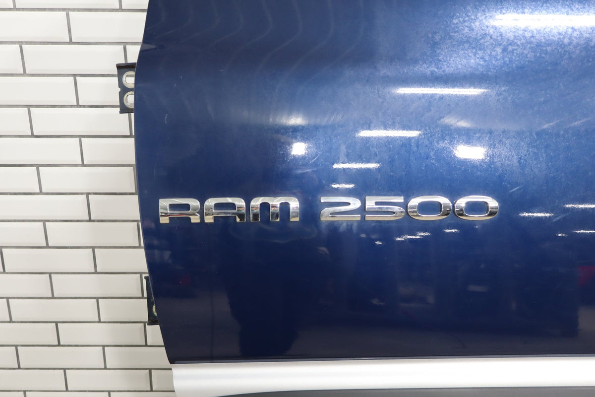 02-08 Dodge Ram Quad LF Door 55275853AG Less Mirror