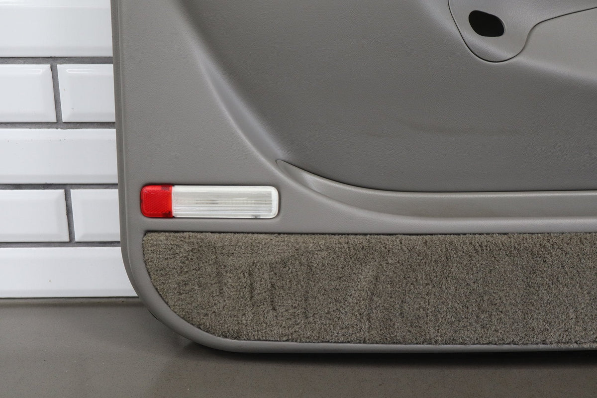 03-06 Chevy Tahoe/Suburban GMT800 Left Front Door Panel Charcoal