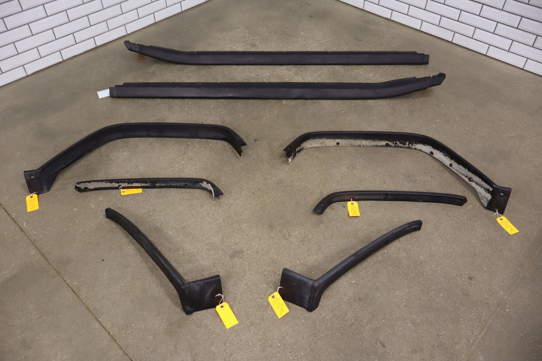 03 - 09 Hummer H2 8 - Piece Exterior Molding Kit (Black Textured Plastic)