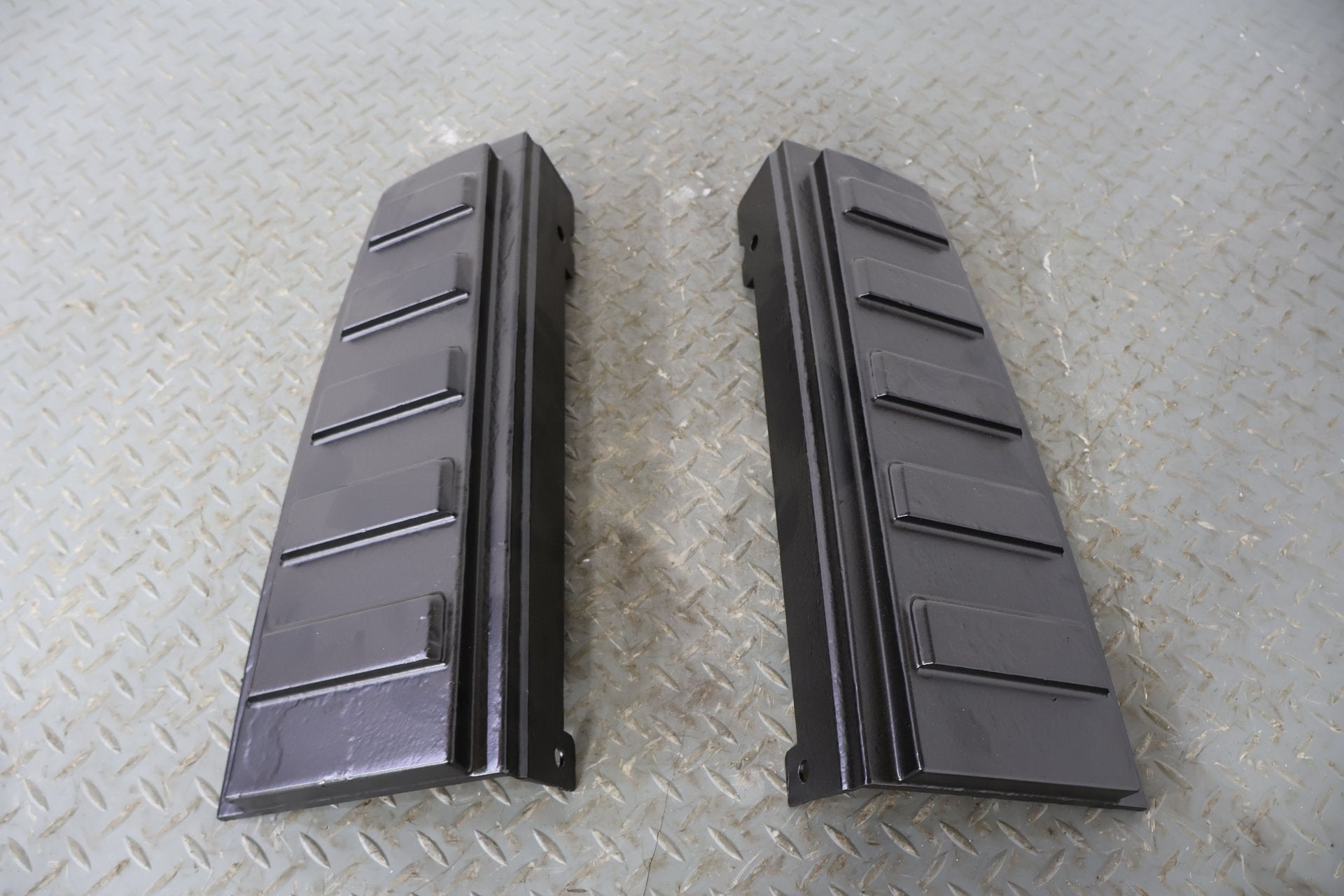 03-09 Hummer H2 Pair LH&RH Metal Upper TailLight Mouldings (Powdercoated Black)