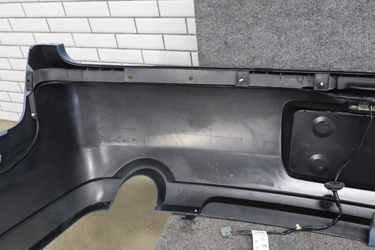 05-09 Ford Mustang GT S197 Rear Bumper With Markers (Windveil Blue P3) (Scrape)