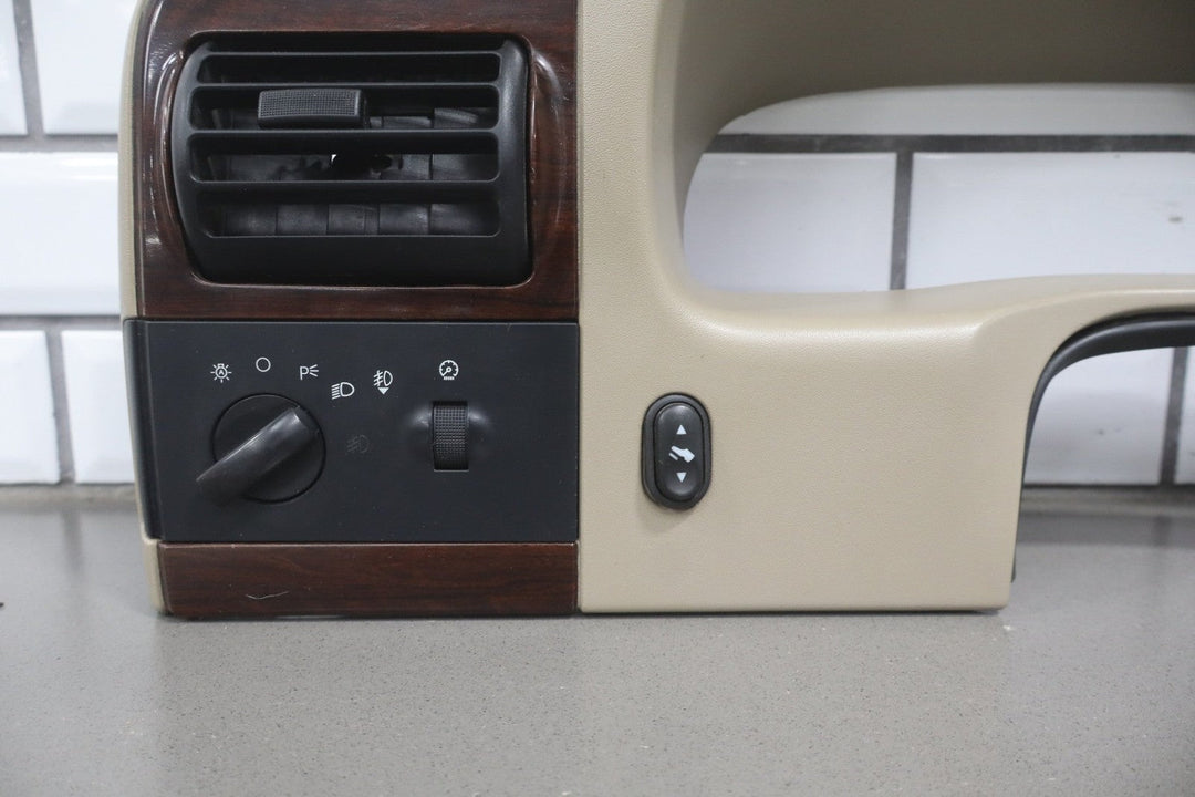 05 to 07 Ford F250 F350 SD Dash Cluster Radio Bezel Trim Panel Wood Grain OEM