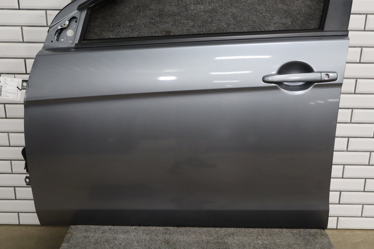 08-15 Mitsubishi Lancer Evo X Left Front Door (Gray U17 Damage)