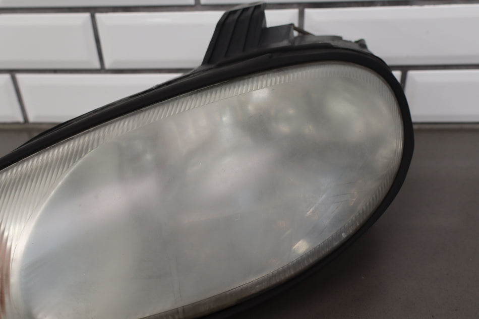 1999-2000 Mazda MX-5 Miata Left Headlamp NC1051040E