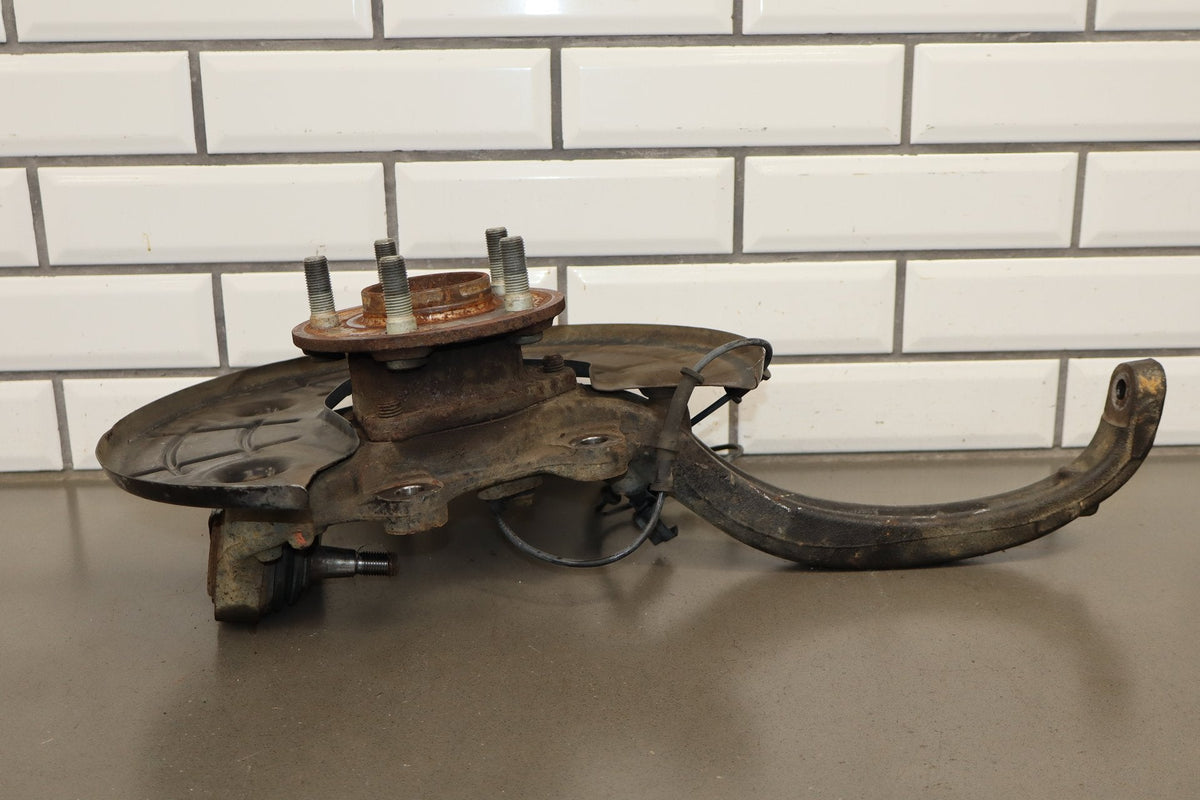 11-14 Dodge Challenger LH Driver Front Spindle Knuckle Hub ABS OEM