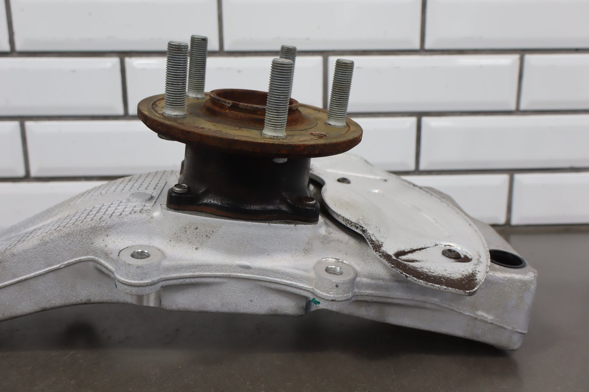 12-16 Tesla Model S RWD Passenger Right Front Spindle Knuckle OEM