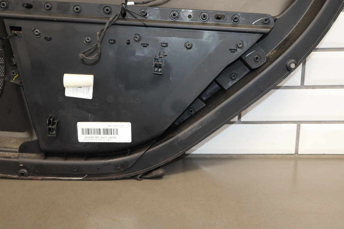 13-18 Ram 4th Gen Laramie Crew Cab Left Rear Interior Door Panel