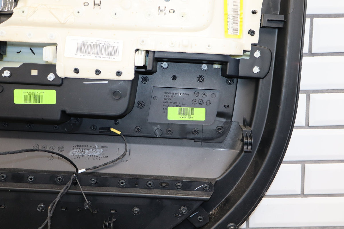 13-18 Ram 4th Gen Laramie Crew Cab Left Rear Interior Door Panel