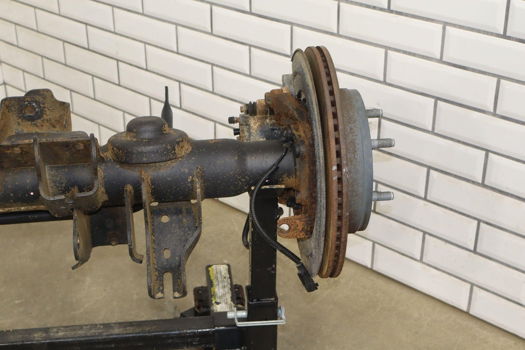 13 - 24 Ram 1500 (5 Lug) 4x4 OEM Solid Rear Axle (3.21 Ratio) W/Brakes