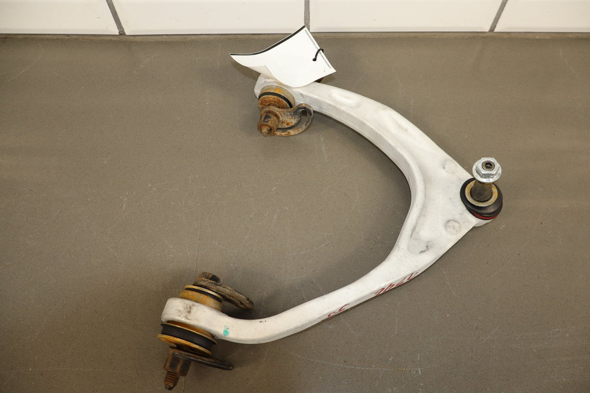 14-17 Cadillac Escalade RF Knee Hub Arms 23125969