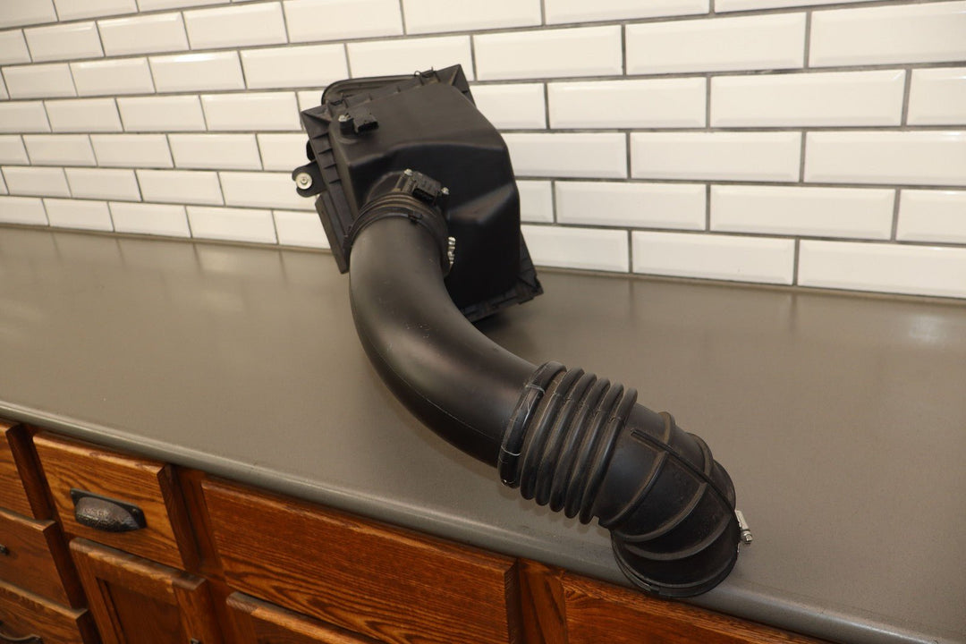 16 - 19 Nissan Titan 5.0L V8 Diesel OEM Air Intake Cleaner Tube Box Base