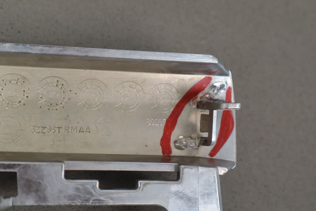 19 - 23 Ram 1500 Limited Front Left Lower Grille Apllique (6ZZ93TRMAA) Repaired