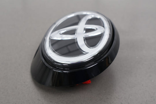 19 - 23 Toyota Corolloa OEM Rear Hatch Mounted Emblem (Black Base) 67930 - 12060