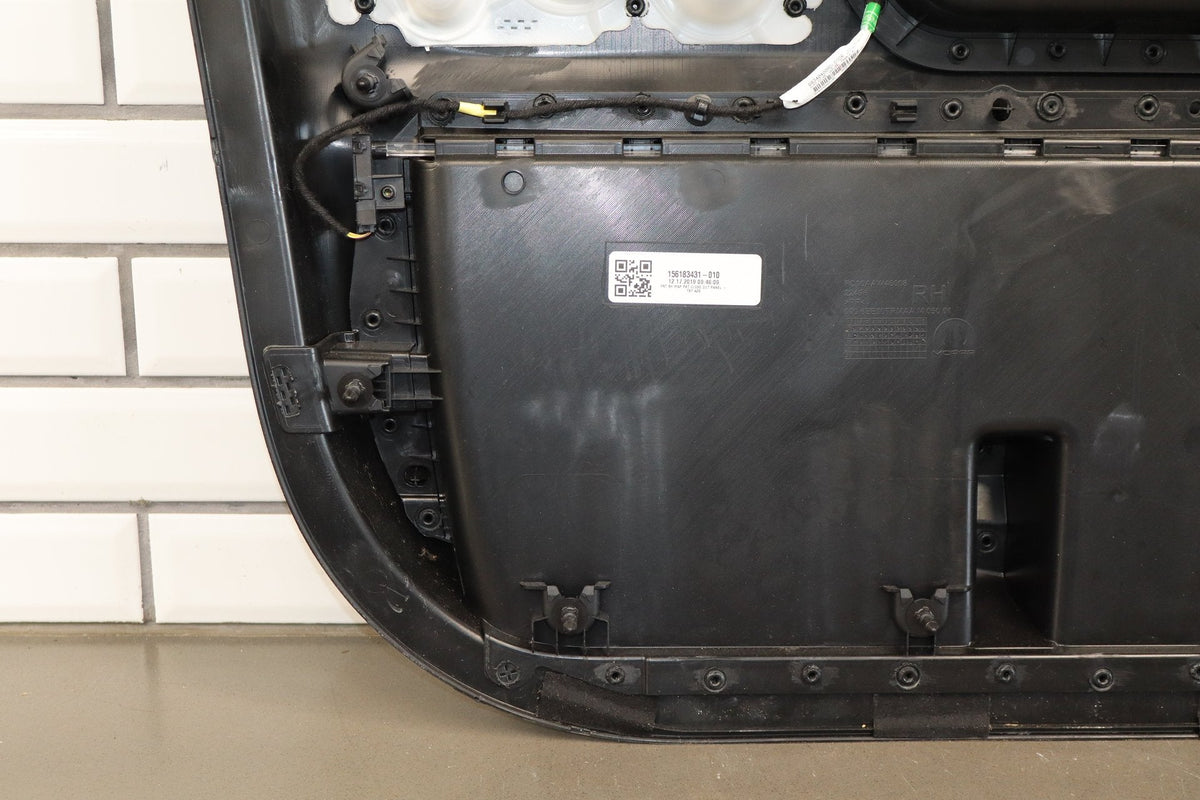 19-24 Ram 1500 (DT) Right Front Door Trim Panel (Black X9)
