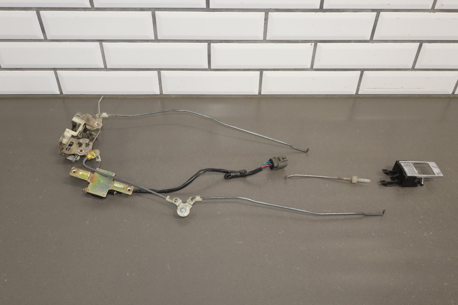 1986 Nissan 300ZX Left Front Door Latch OEM