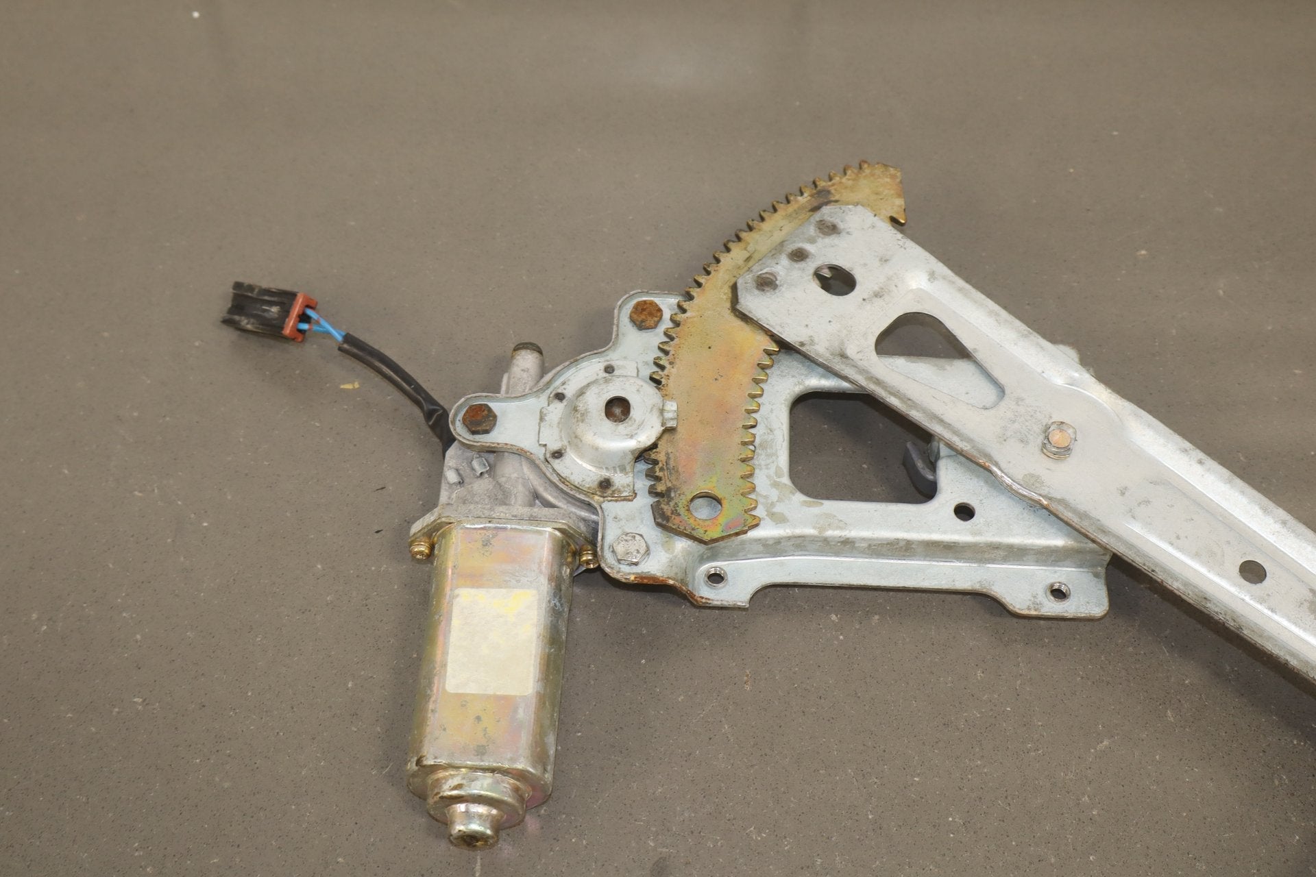 1986 Nissan 300ZX Left Front Door Regulator OEM