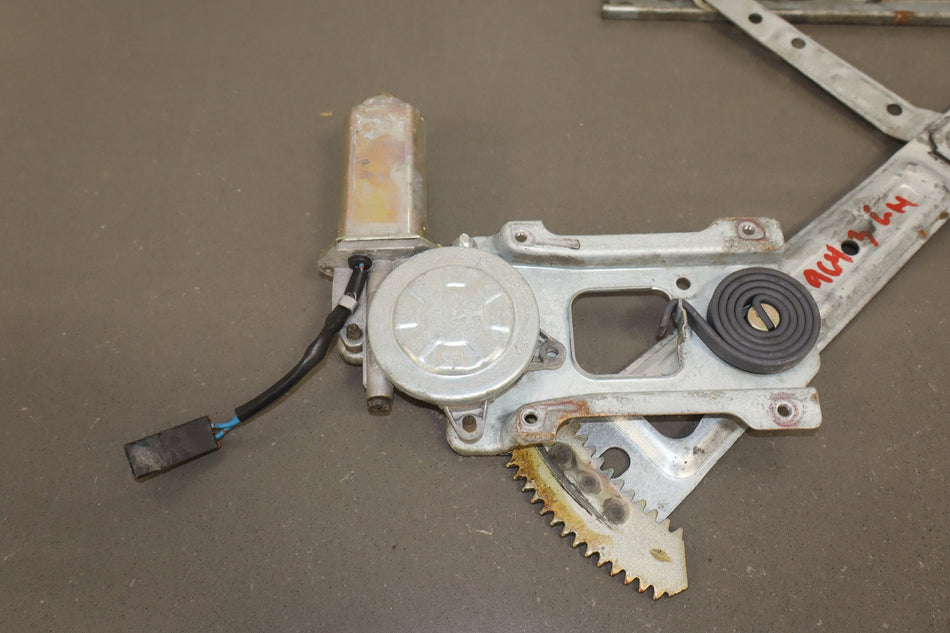 1986 Nissan 300ZX Left Front Door Regulator OEM
