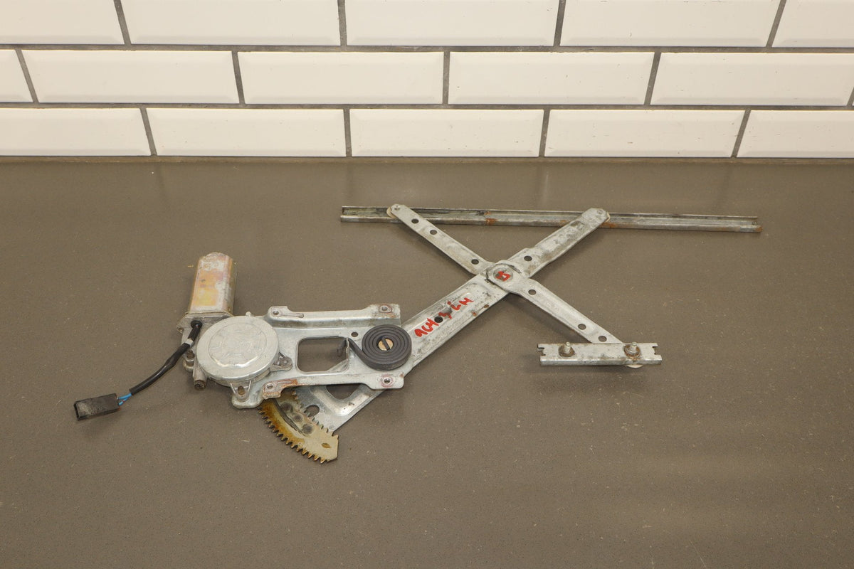 1986 Nissan 300ZX Left Front Door Regulator OEM