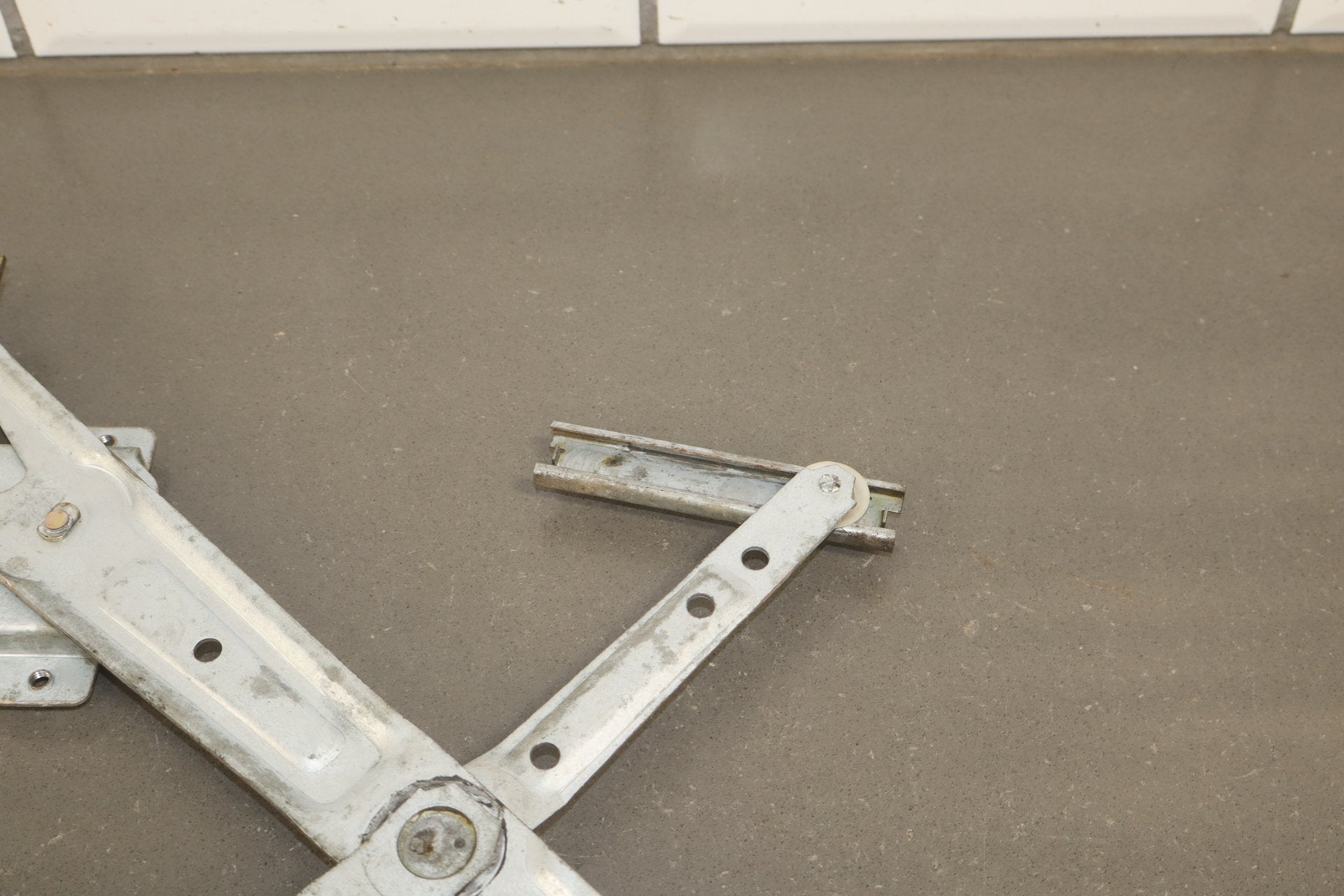 1986 Nissan 300ZX Left Front Door Regulator OEM
