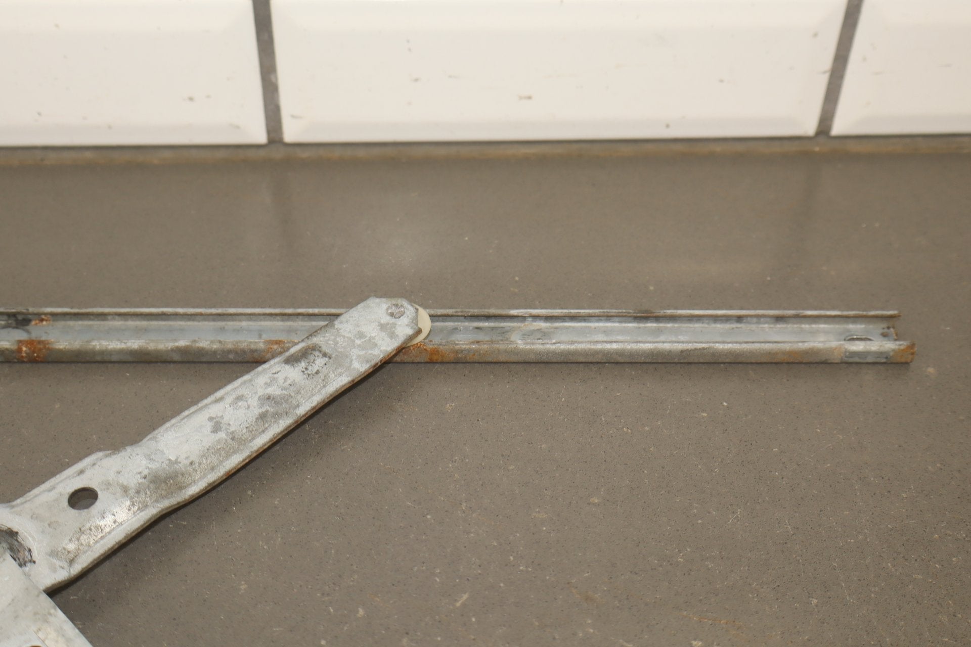 1986 Nissan 300ZX Left Front Door Regulator OEM
