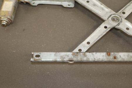 1986 Nissan 300ZX Left Front Door Regulator OEM