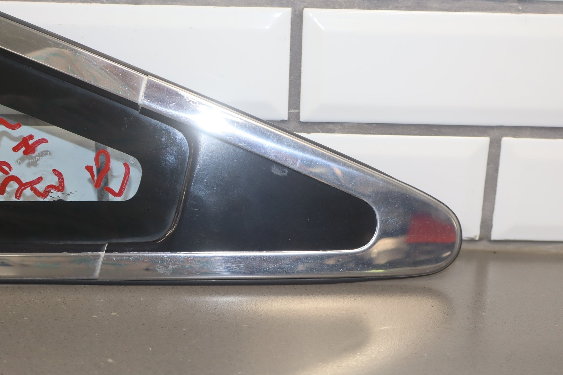 1986 Nissan 300ZX Left Quarter Window OEM | Chrome Dented